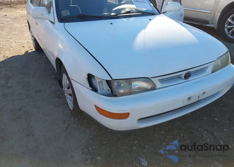 1997 Toyota Corolla Dx z USA, uszkodzony, nr VIN 1NXBB02E9VZ513481
